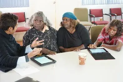 Researcher Maree Meredith with Kathy Maringka from Fregon and Puntjiti Lewis and Renita Stanley from Ernabella 