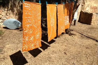 Practise silks drying in the sun after their first dye