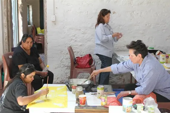 Goolwa artists working with silk and hot bees wax for the first time at the Old Police Stables