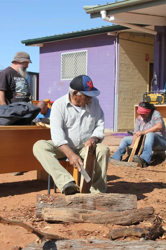 Roy and Kara work with Cliff looking on.